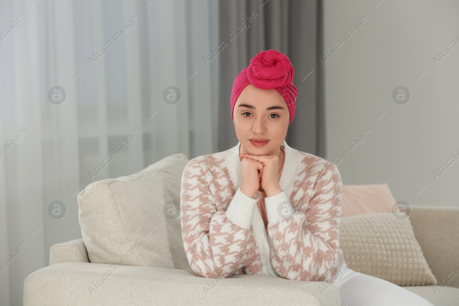 Photo of Portrait of beautiful woman with cancer on sofa at home