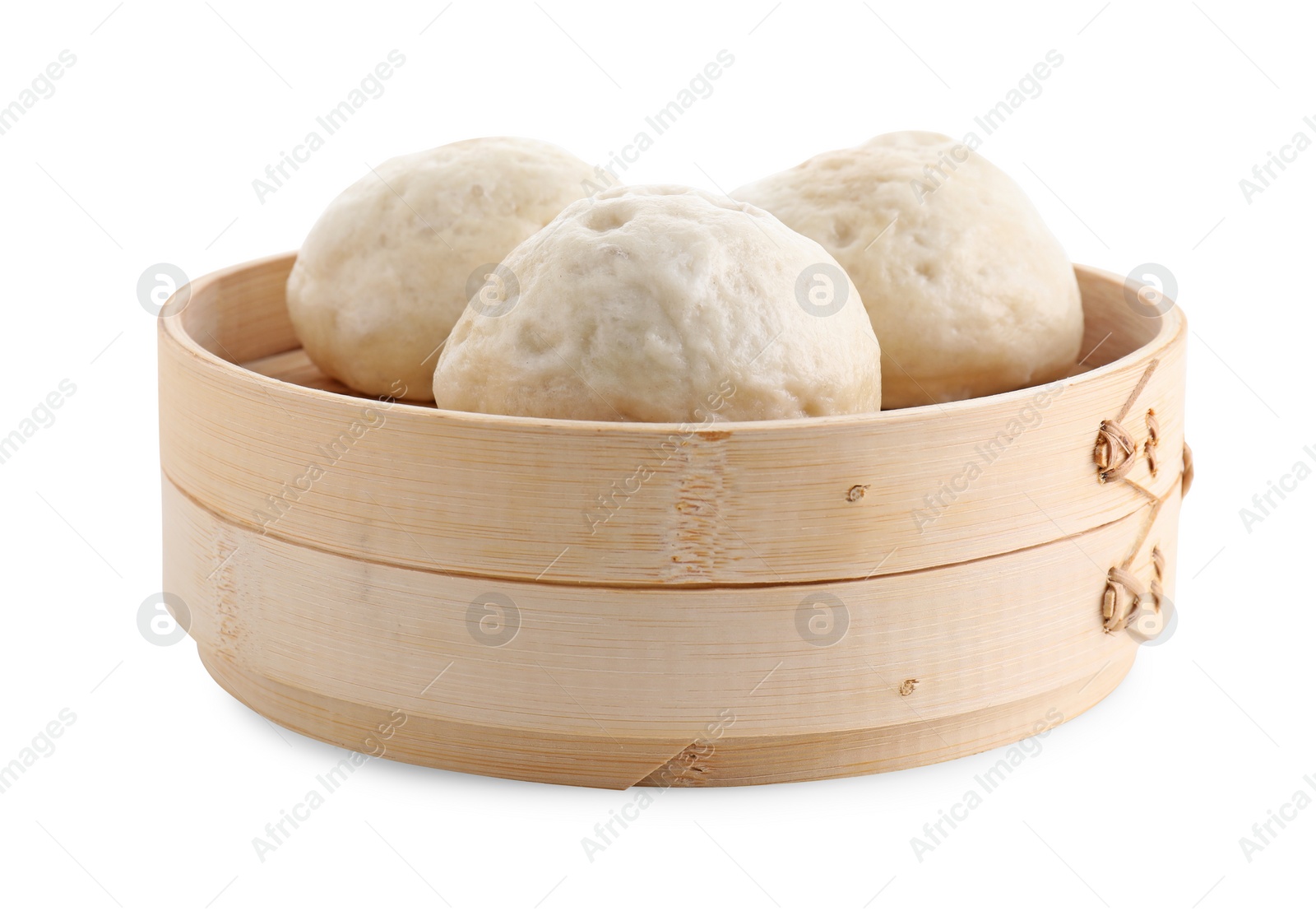 Photo of Delicious chinese steamed buns in bamboo steamer isolated on white