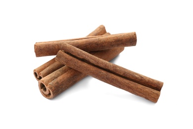 Aromatic cinnamon sticks on white background