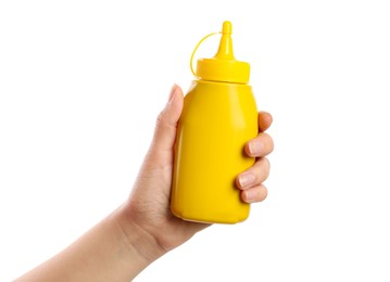 Photo of Woman with bottle of mustard on white background, closeup