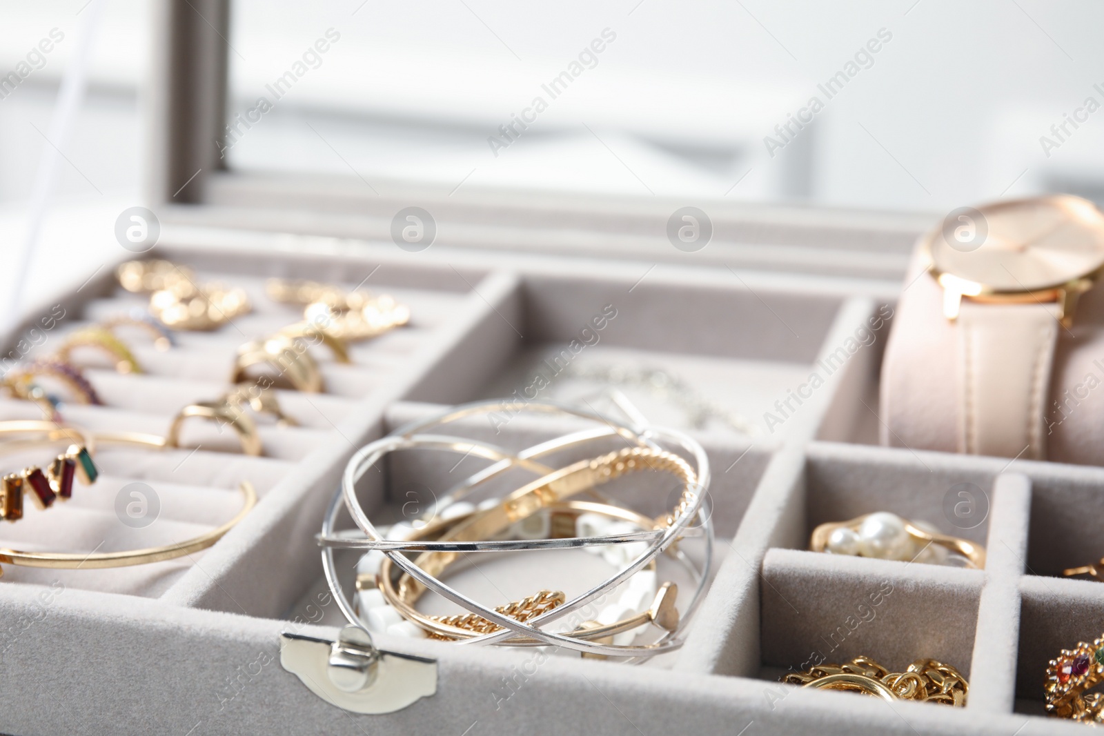 Photo of Elegant jewelry box with beautiful bijouterie, closeup