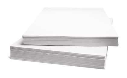 Stacks of paper sheets on white background