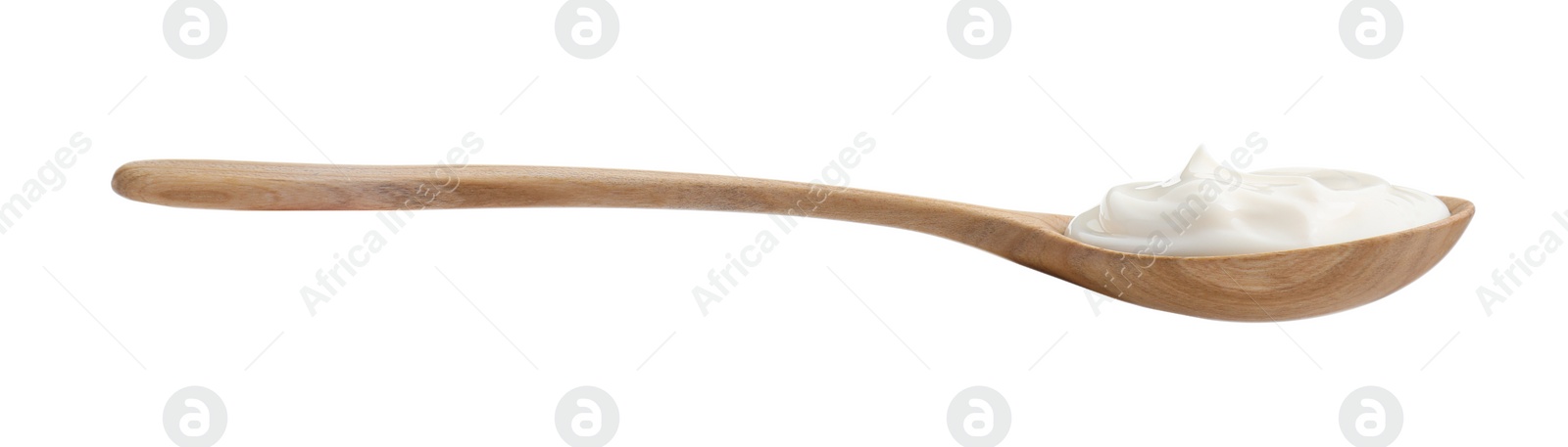 Photo of One wooden spoon with mayonnaise isolated on white