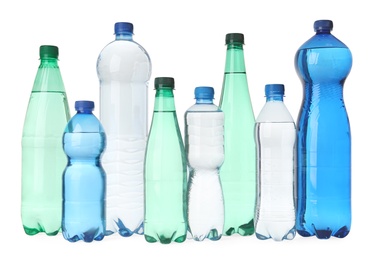 Photo of Plastic bottles with water isolated on white