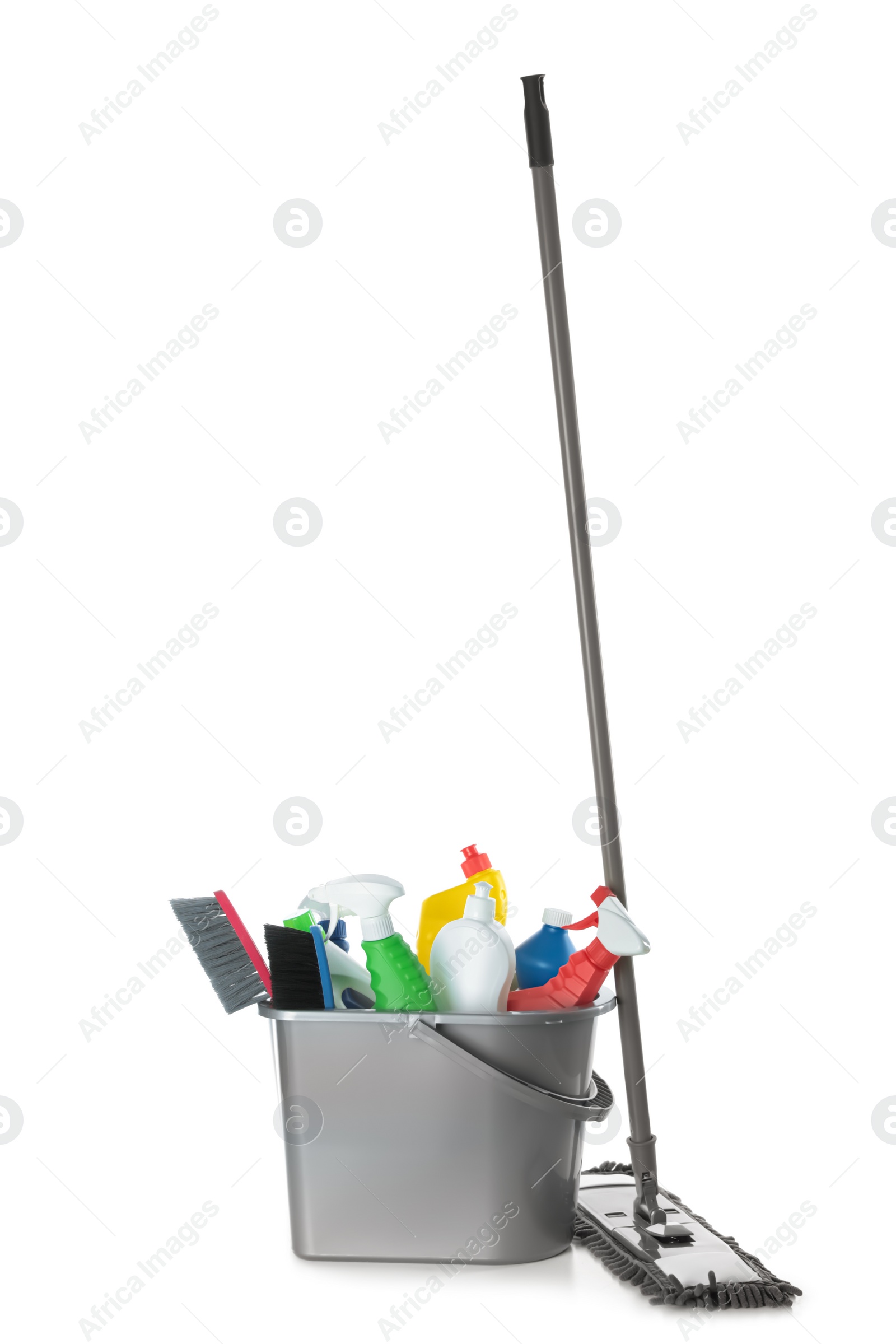 Photo of Mop and plastic bucket with different cleaning supplies on white background