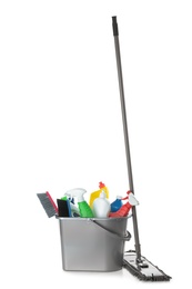 Mop and plastic bucket with different cleaning supplies on white background