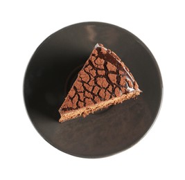 Piece of delicious chocolate truffle cake isolated on white, top view