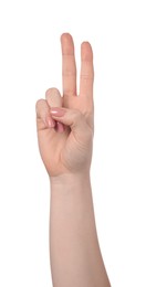 Playing rock, paper and scissors. Woman making scissors with her fingers on white background, closeup