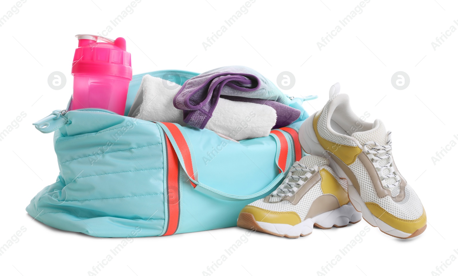 Photo of Sports bag with gym equipment on white background