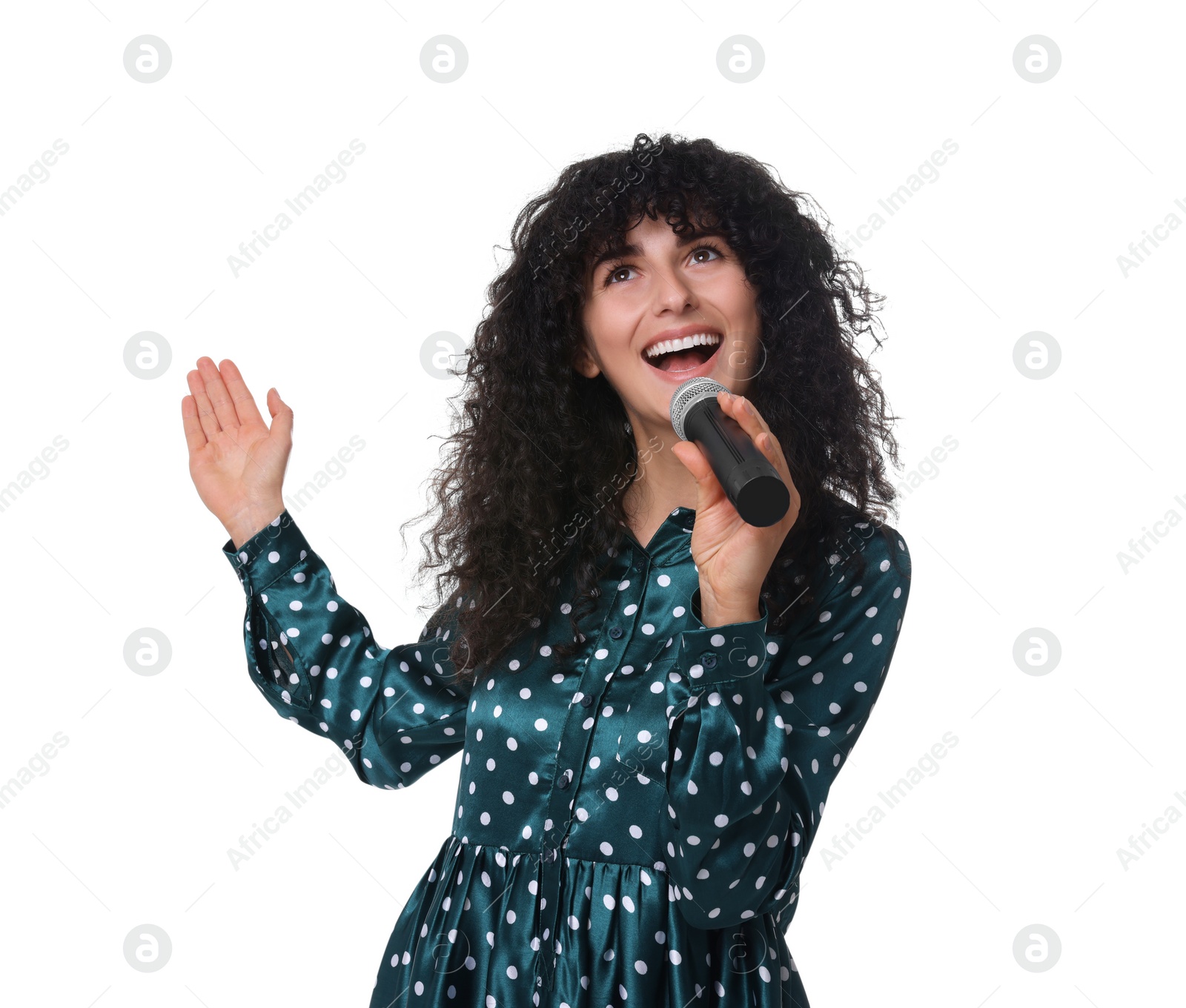 Photo of Beautiful young woman with microphone singing on white background