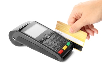 Woman using modern payment terminal on white background, closeup