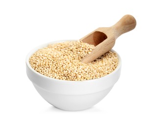 Bowl with quinoa and wooden scoop on white background