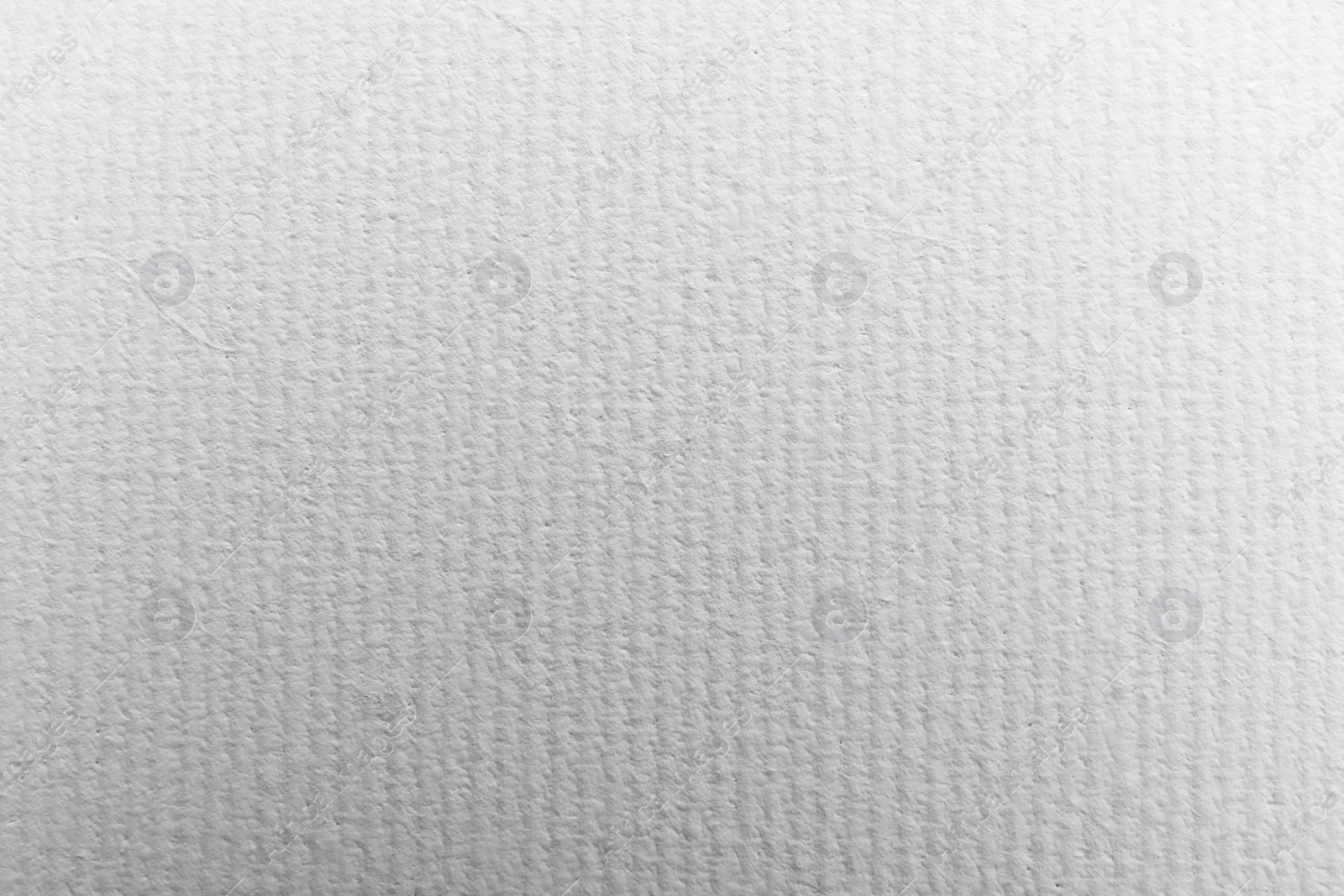 Photo of Blank white canvas as background, closeup view