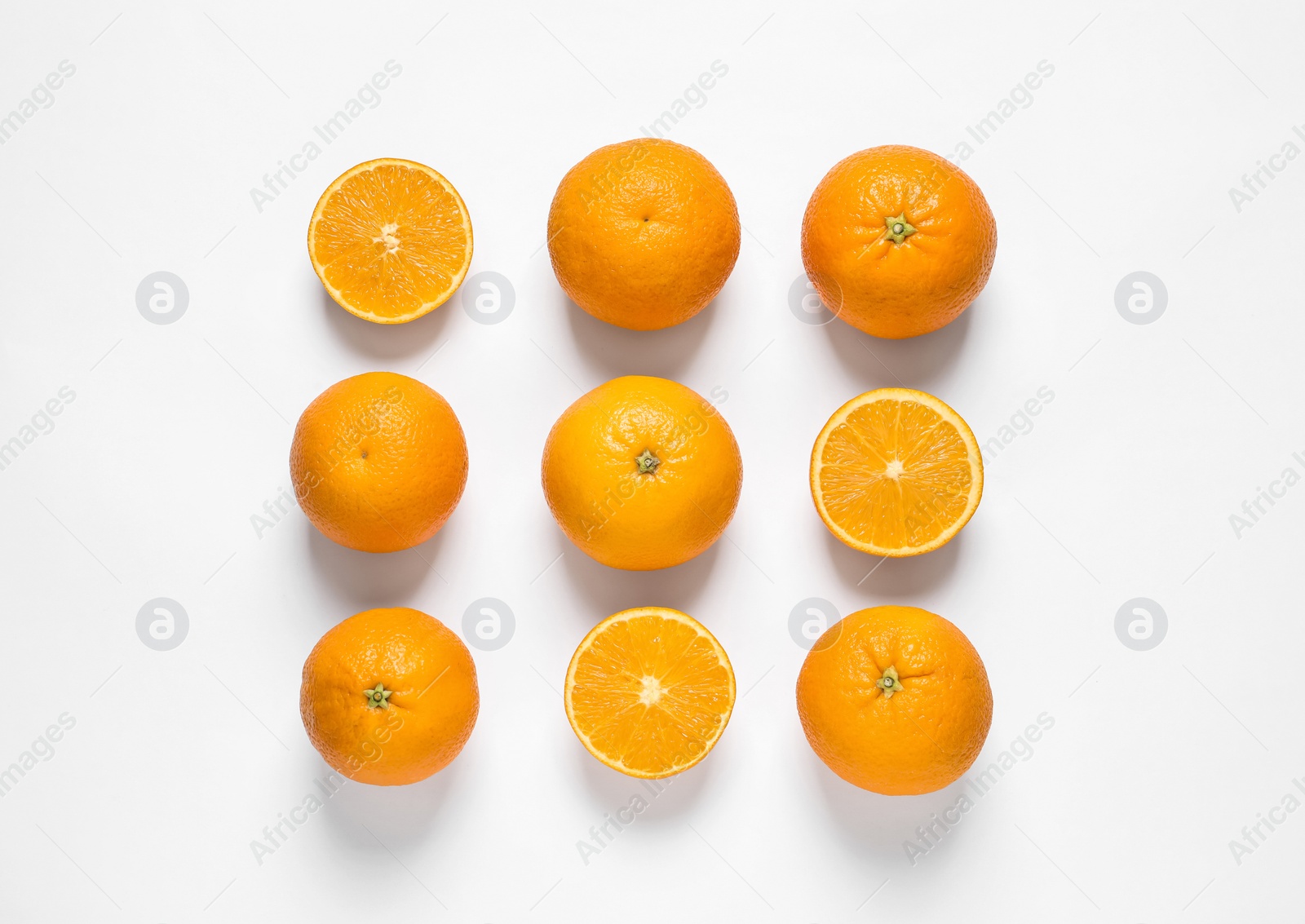 Photo of Composition with ripe oranges on white background, top view