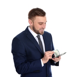 Photo of Portrait of young businessman holding money banknotes on white background