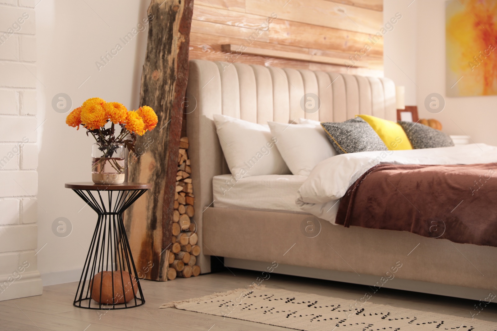 Photo of Cozy bedroom interior inspired by autumn color scheme