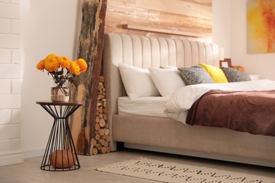 Cozy bedroom interior inspired by autumn color scheme