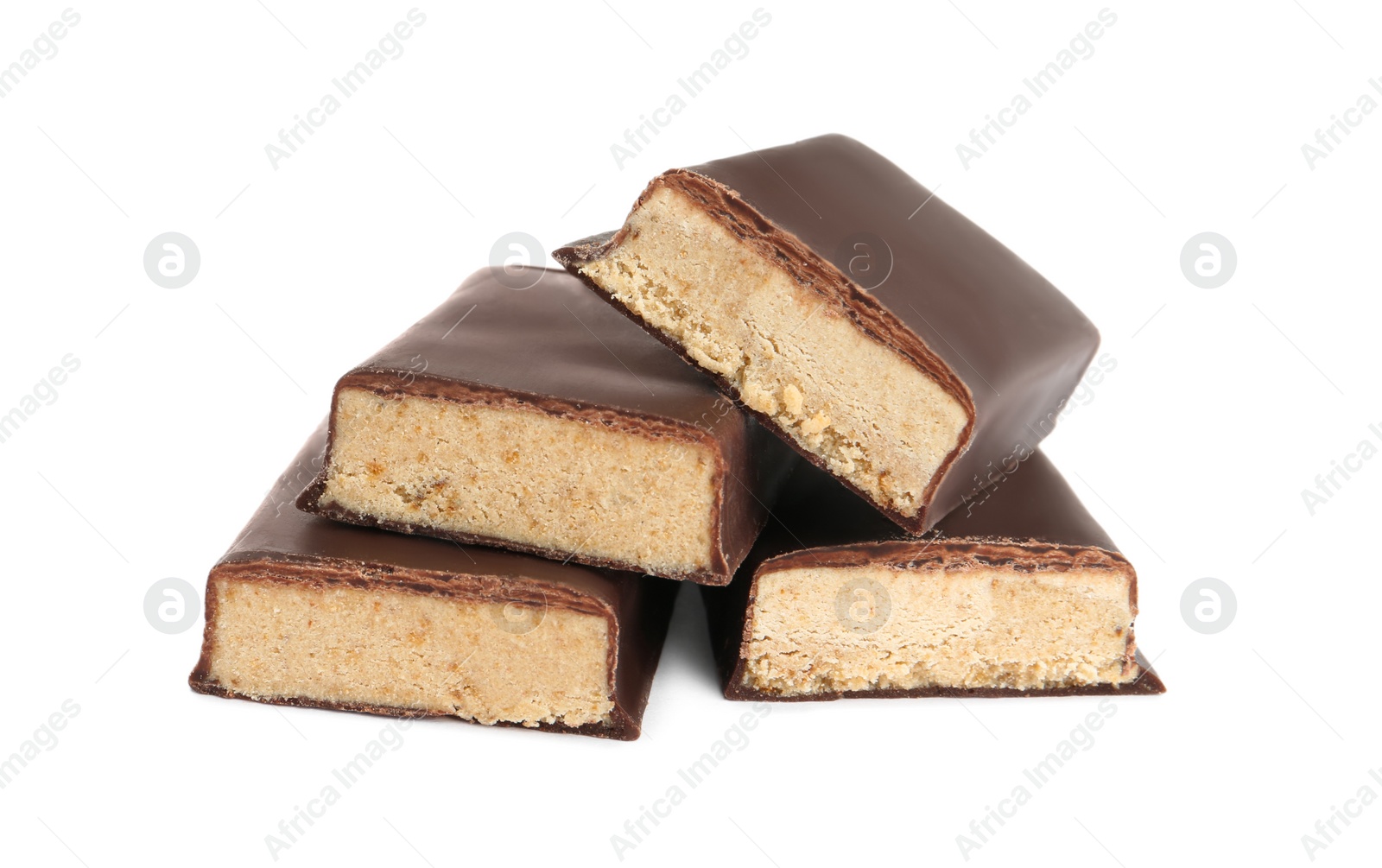 Photo of Halves of tasty chocolate glazed protein bar on white background