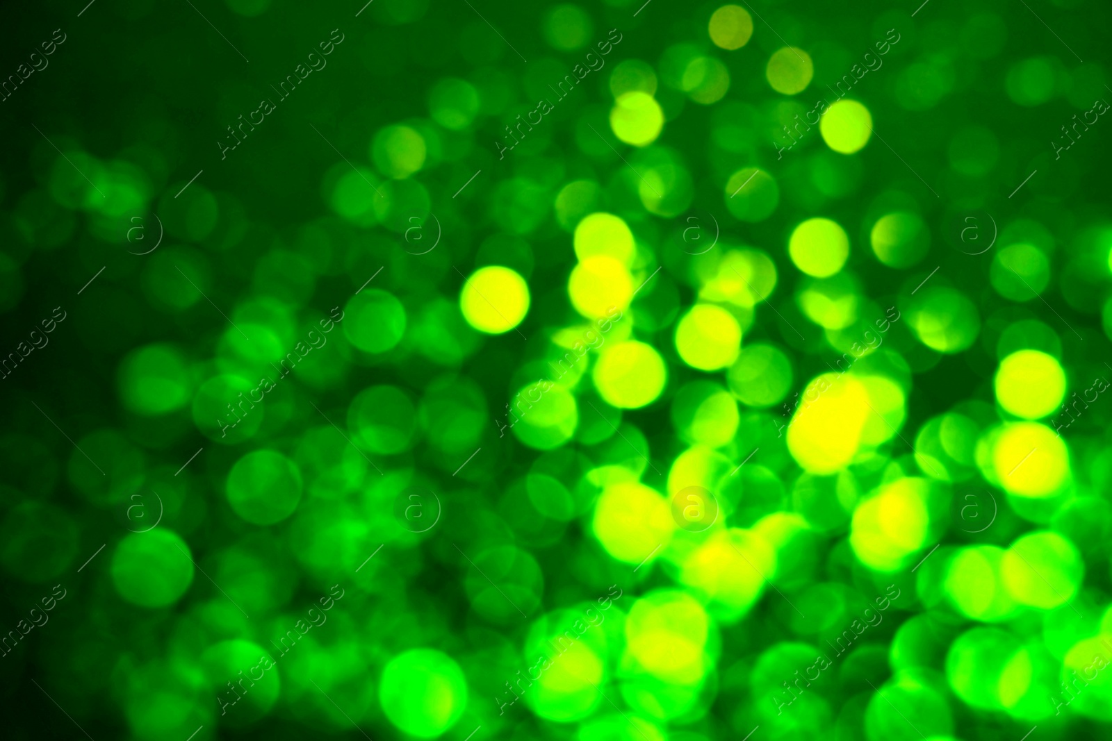 Image of St. Patrick day. Green background with blurred lights, bokeh effect