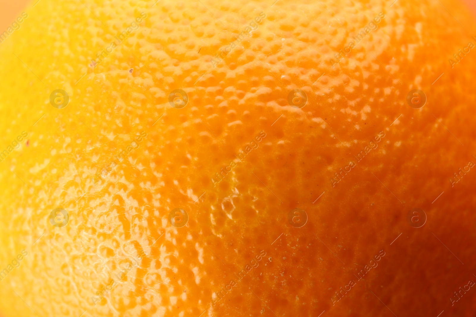 Photo of Delicious unpeeled orange fruit as background, closeup