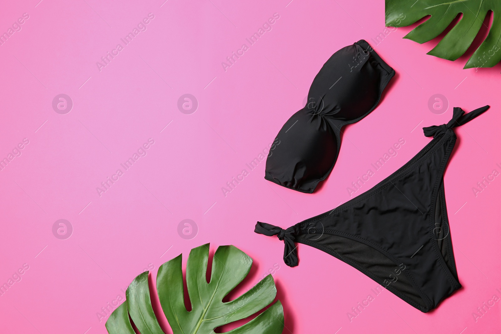 Photo of Flat lay composition with stylish bikini on color background. Space for text