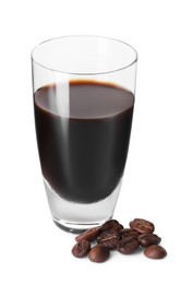 Photo of Shot glass with coffee liqueur and beans isolated on white