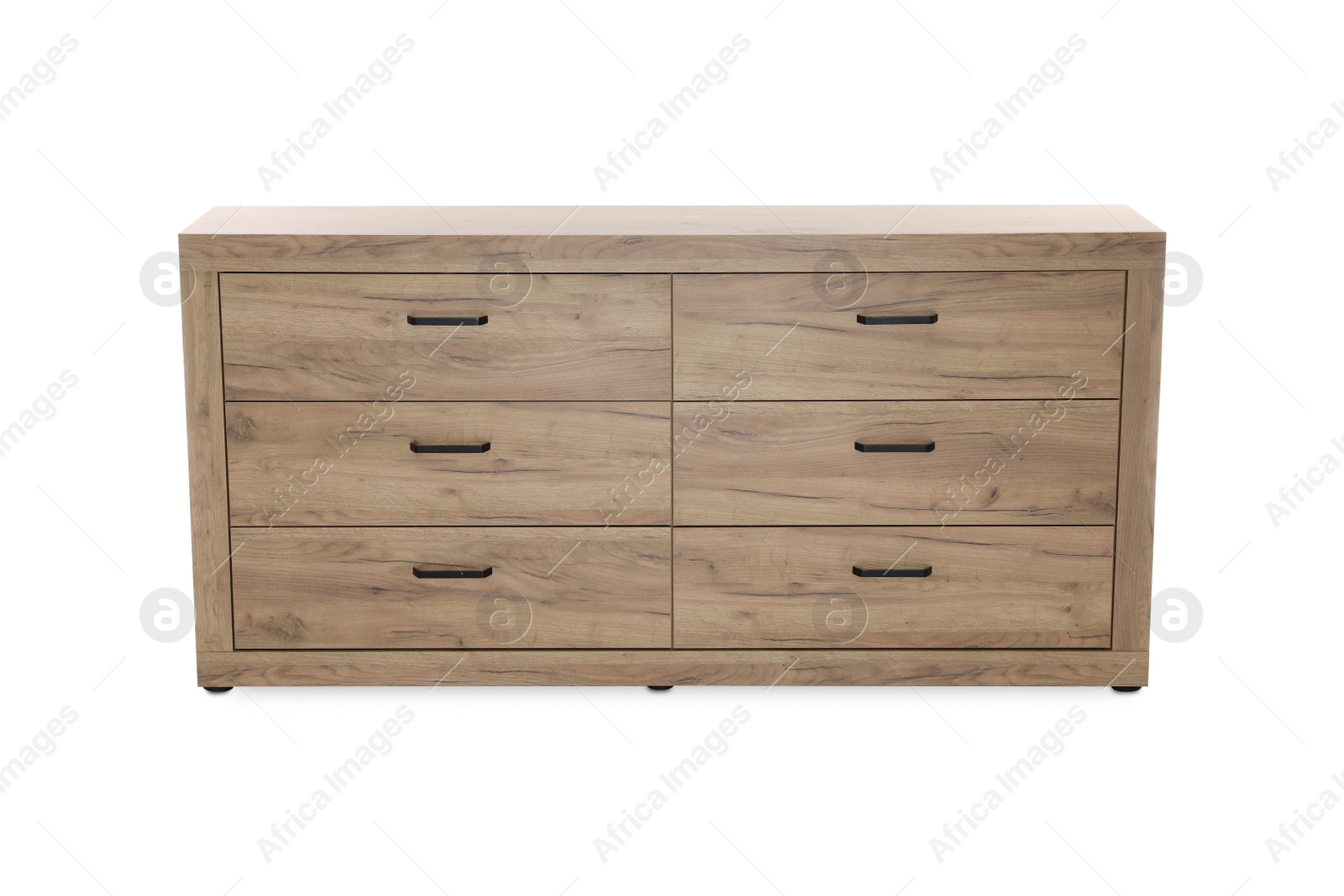 Photo of New wooden chest of drawers isolated on white