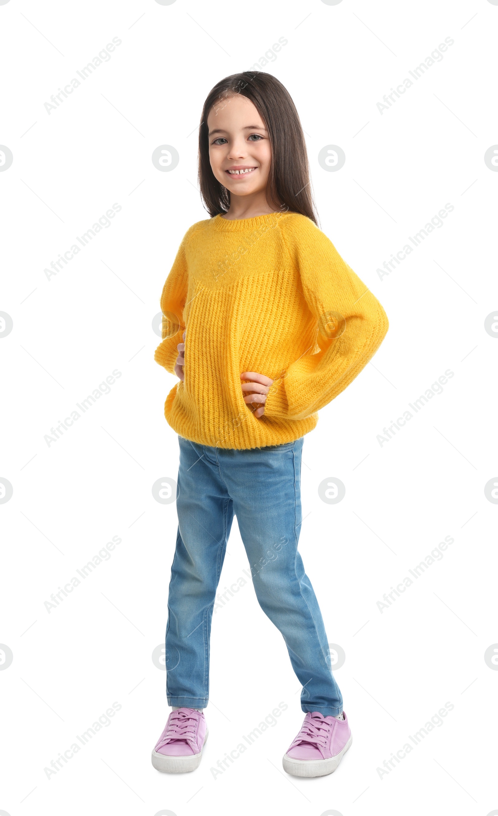 Photo of Cute little girl posing on white background