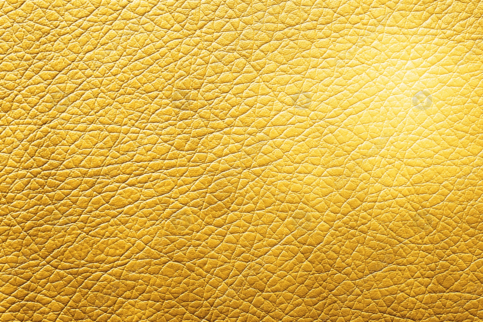 Image of Golden textured surface as background, closeup view