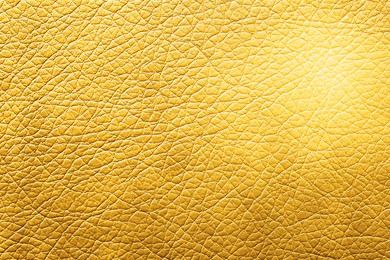 Image of Golden textured surface as background, closeup view