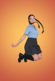 Image of Happy cute girl in school uniform jumping on color gradient background