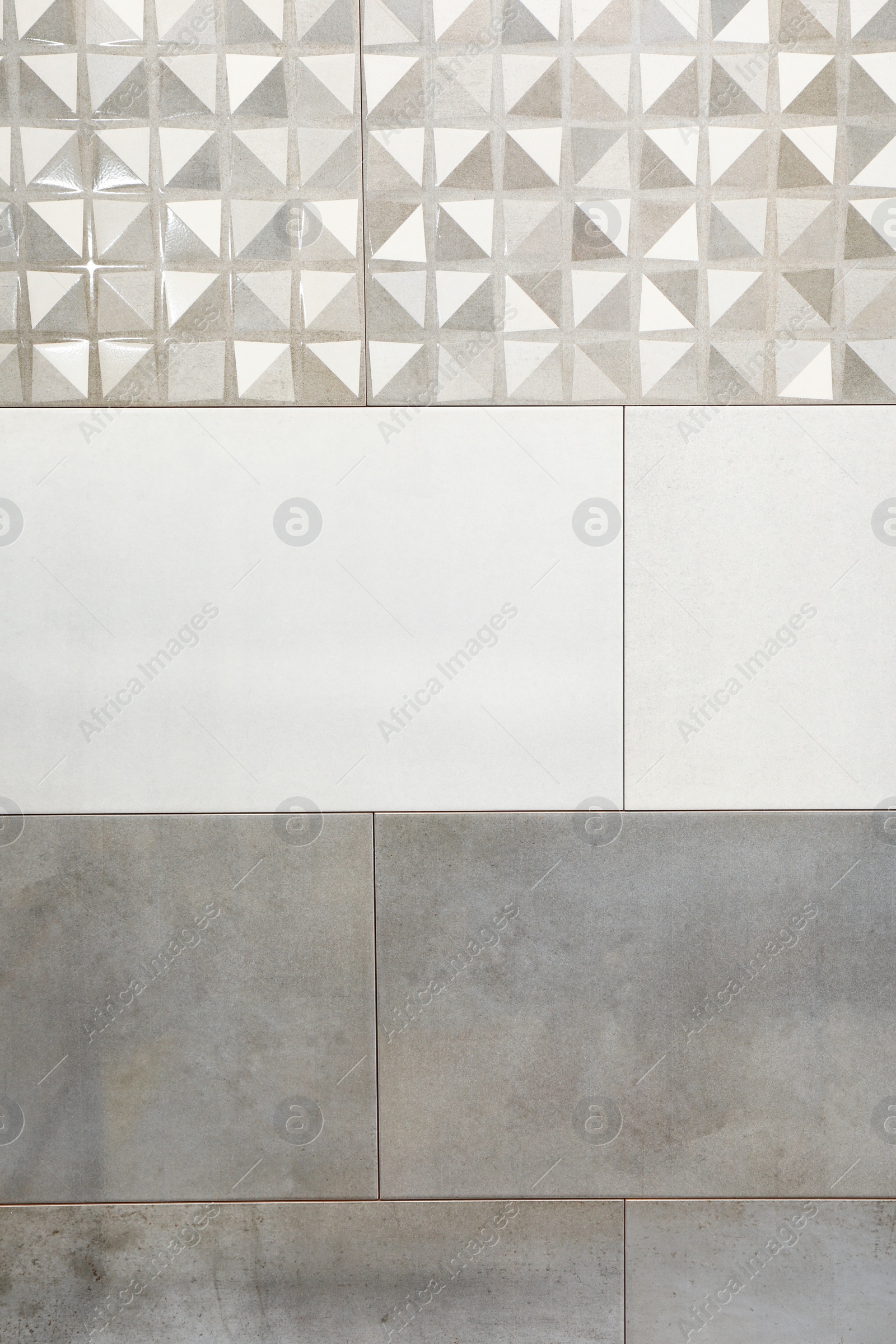 Photo of Different samples of tiles on display in store