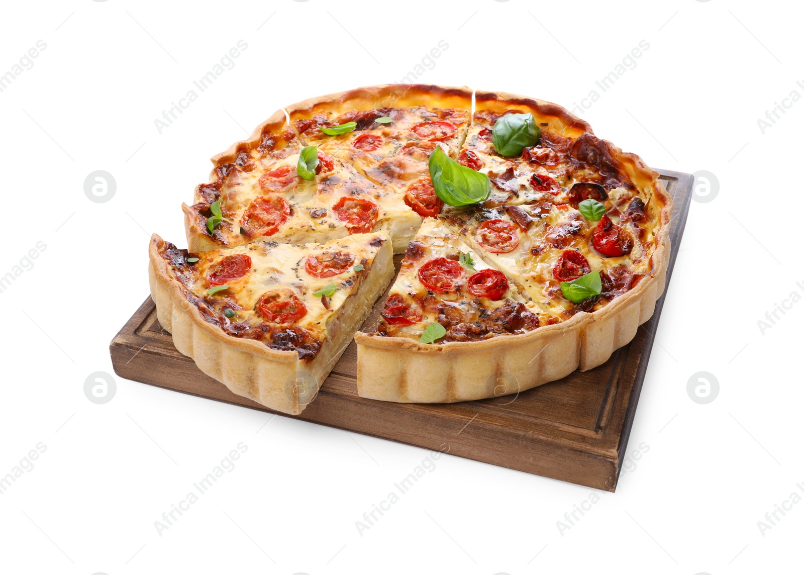 Photo of Cut delicious homemade quiche with prosciutto, tomatoes and basil isolated on white