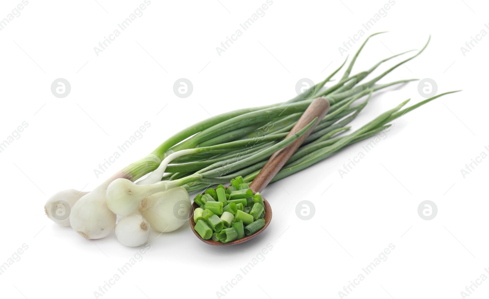 Photo of Spoon with chopped green onion and stems on white background