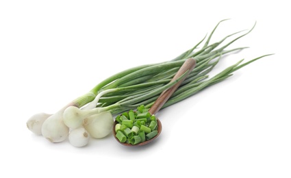 Photo of Spoon with chopped green onion and stems on white background