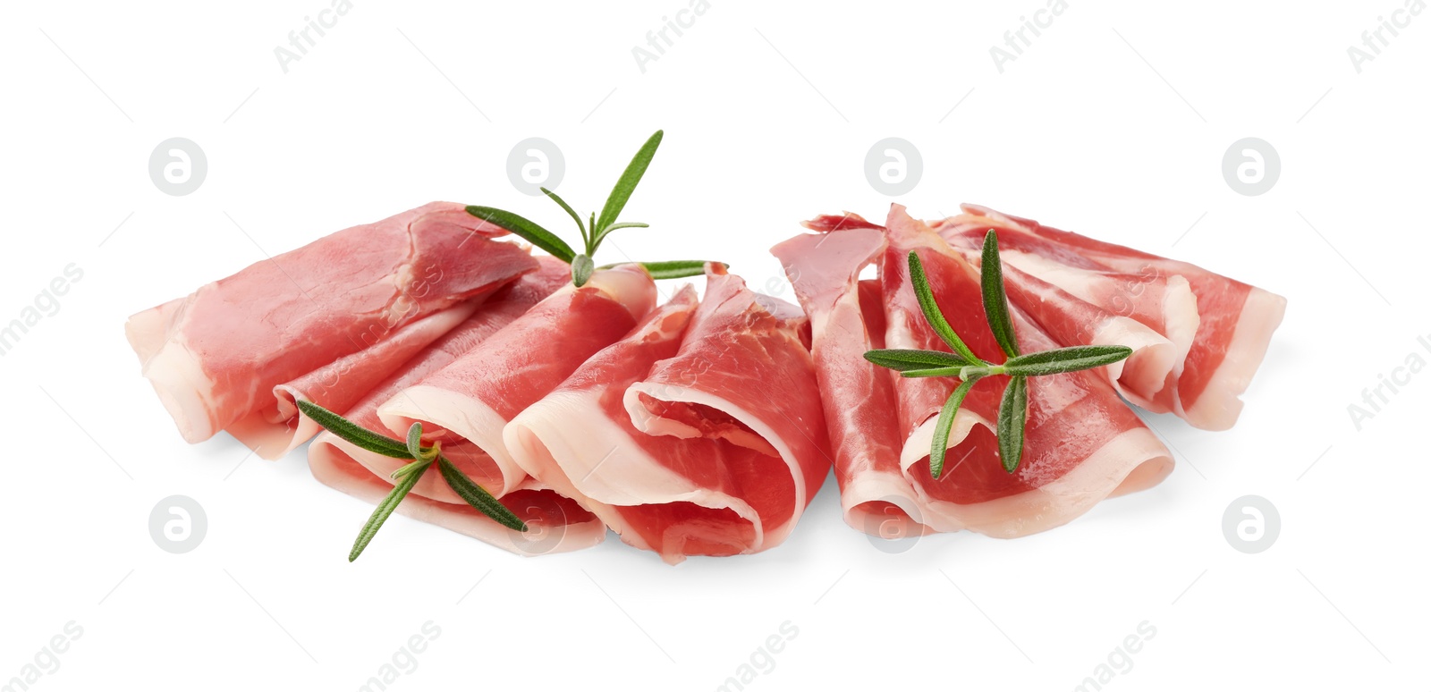 Photo of Delicious sliced jamon with rosemary on white background