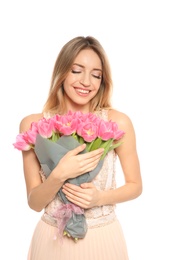 Photo of Portrait of smiling young girl with beautiful tulips on white background. International Women's Day