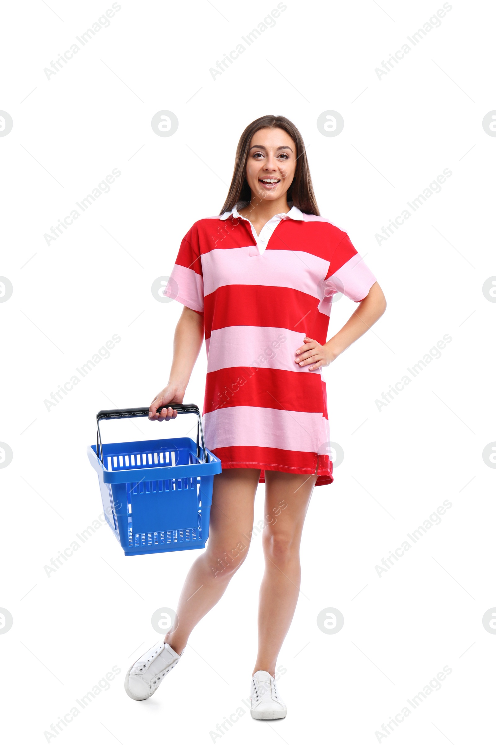 Photo of Young woman with empty shopping basket isolated on white