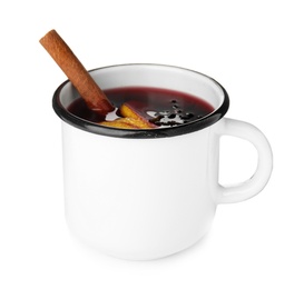 Photo of Mug of mulled wine with spices isolated on white