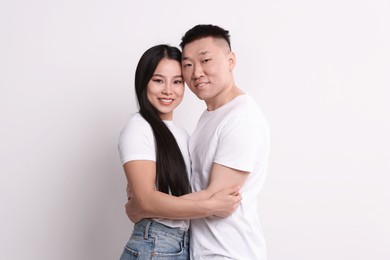 Portrait of happy couple on white background