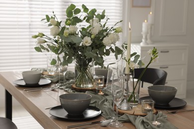 Photo of Festive table setting with beautiful tableware and decor indoors