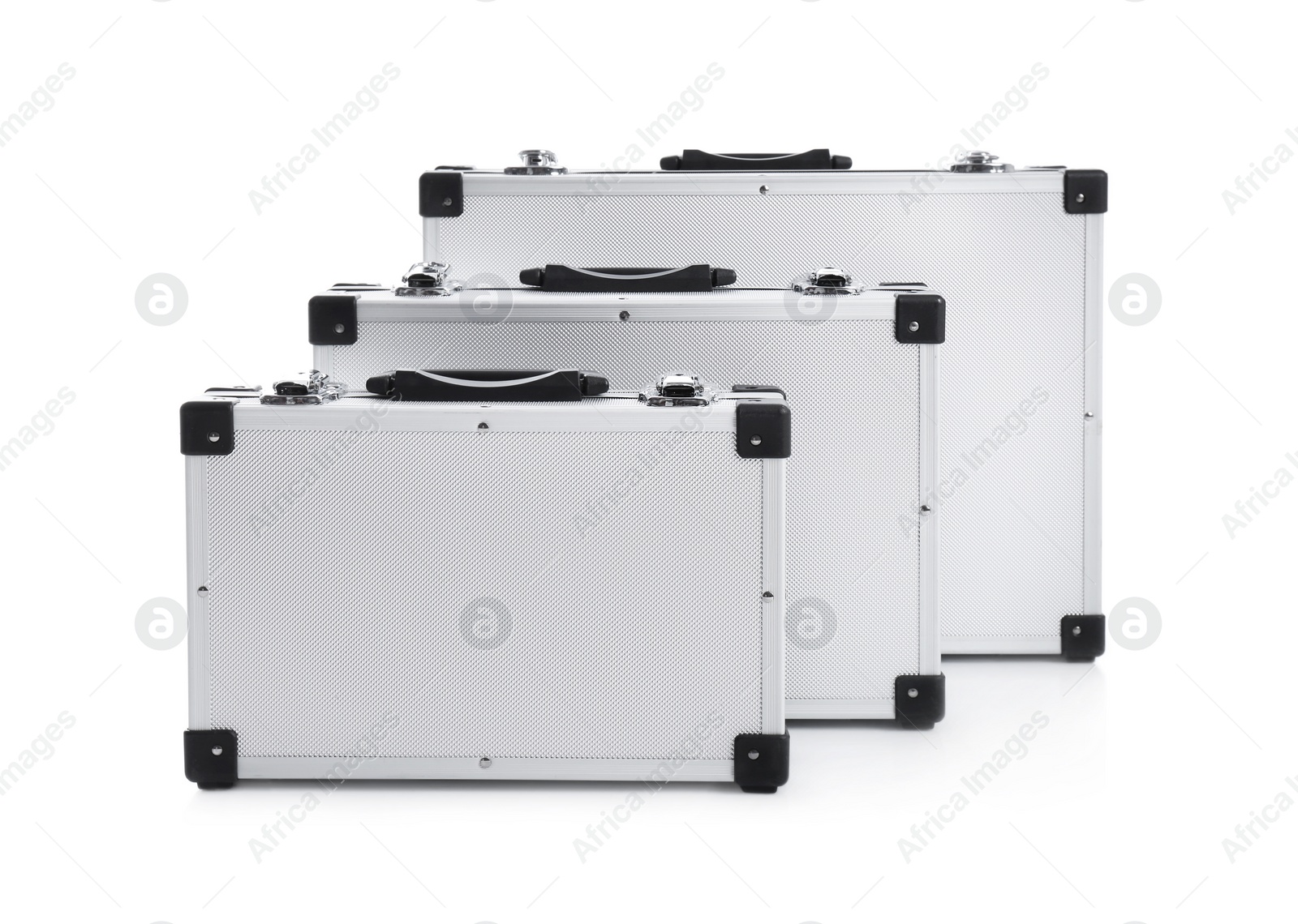 Photo of Set of modern suitcases on white background