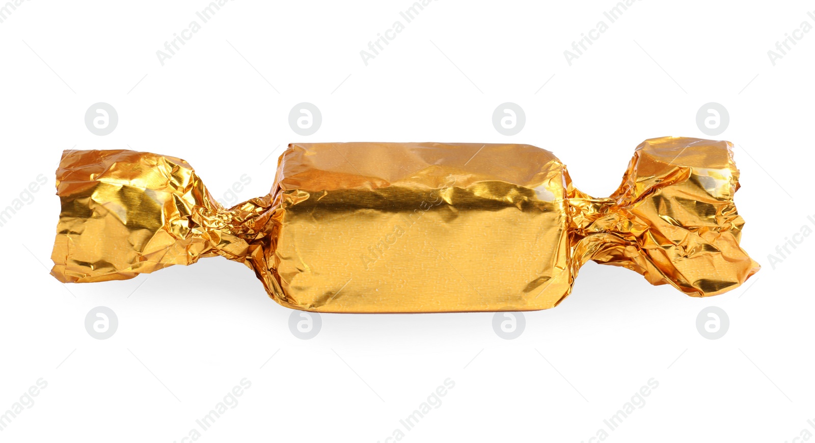 Photo of Tasty candy in golden wrapper isolated on white