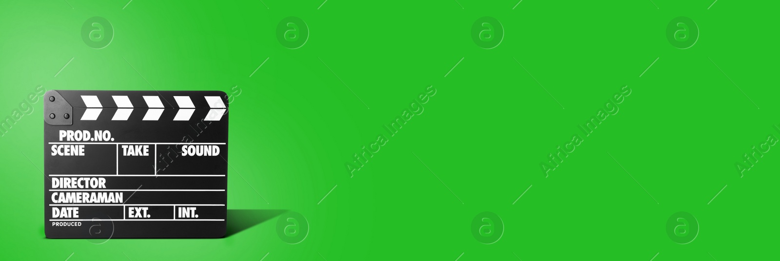 Image of Clapper board on chroma key background, space for text. Banner design