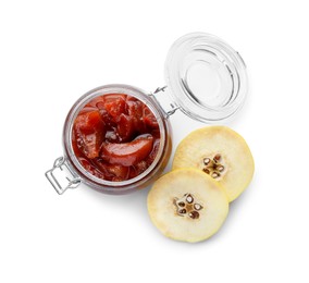 Photo of Quince jam in glass jar and fresh raw fruit isolated on white, top view