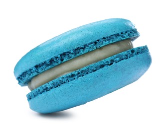 Photo of Light blue macaron isolated on white. Delicious dessert