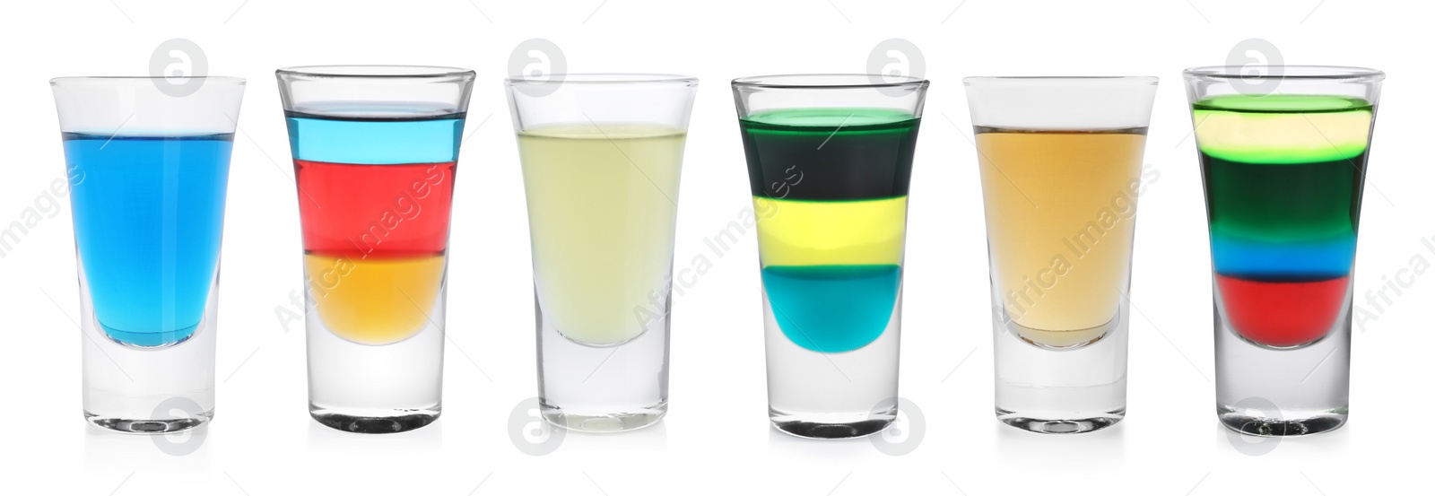 Image of Different shooters in shot glasses isolated on white, set