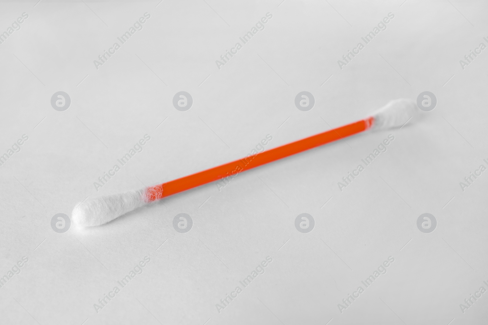 Photo of Clean cotton bud isolated on white. Hygienic accessory