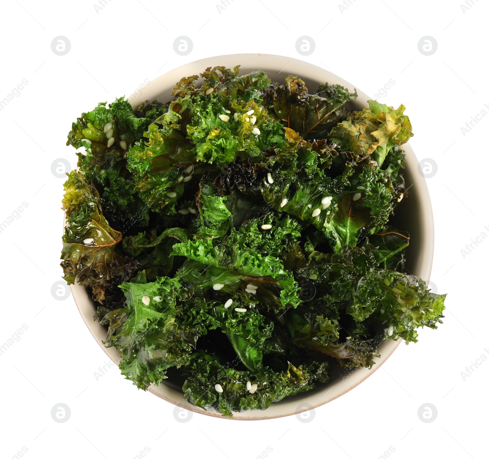 Photo of Tasty baked kale chips isolated on white, top view