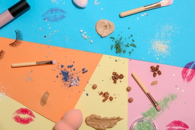 Flat lay composition with cosmetic products on color background